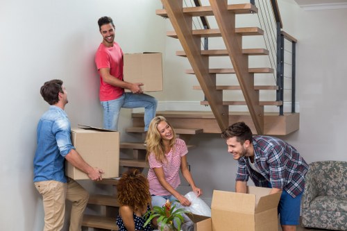 House removals team planning a move in a Dulwich residential street