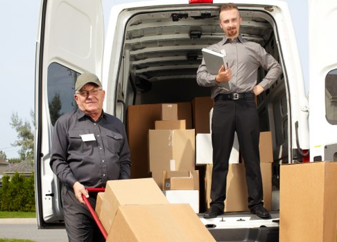 Removal team preparing boxes and furniture for a Dulwich home move