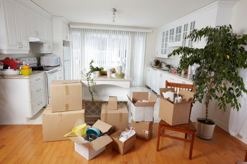 Staff organizing packing and labels for a workplace relocation