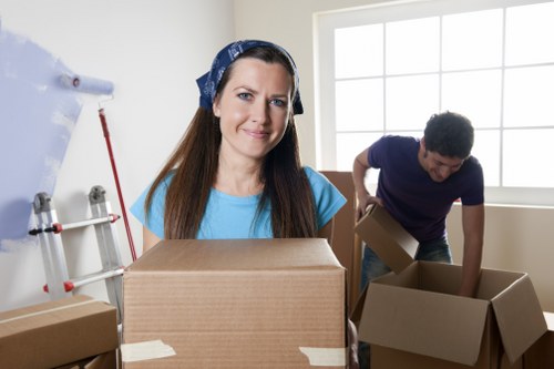 Professional removals team handling furniture in Dulwich