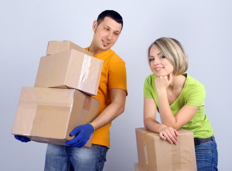 Removal team loading household items for a UK move