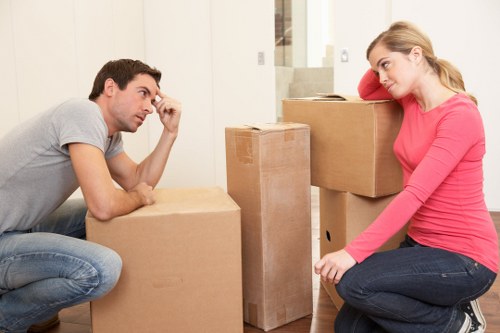 Furniture and boxes being loaded into a moving van in Dulwich