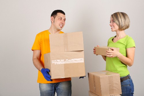 Local Dulwich moving team carrying furniture