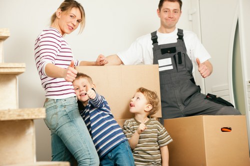 Professional same day removals team loading furniture